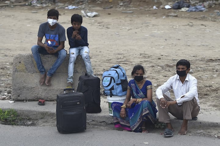 The plight of the migrant workers continued even after the Ministry of Home Affairs issued guidelines to allow states to bring back the people stranded in other parts of the country due to the COVID-19 lockdown. (Photo Credit: AFP)
