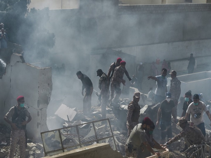 Special PIA Flight For Eid With 107 People On Board Crashes In Karachi's Model Colony Just Before Landing (First Visuals) PIA Flight With 107 People On Board Crashes In Karachi Just Before (First Visuals)