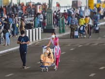 IN PICS| Face Masks, Thermal Checks & PPE Suits: How Airports Across India Are Upholding Safety Norms As Flights Resume