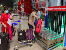 IN PICS| Face Masks, Thermal Checks & PPE Suits: How Airports Across India Are Upholding Safety Norms As Flights Resume
