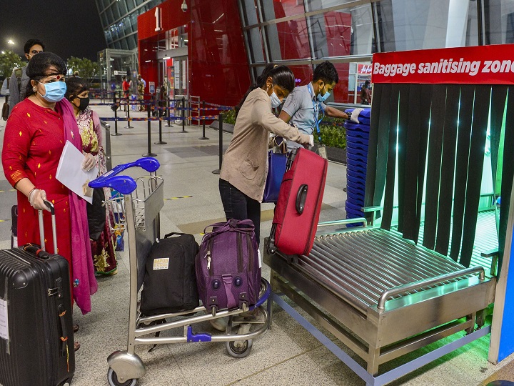 IN PICS| Face Masks, Thermal Checks & PPE Suits: How Airports Across India Are Upholding Safety Norms As Flights Resume