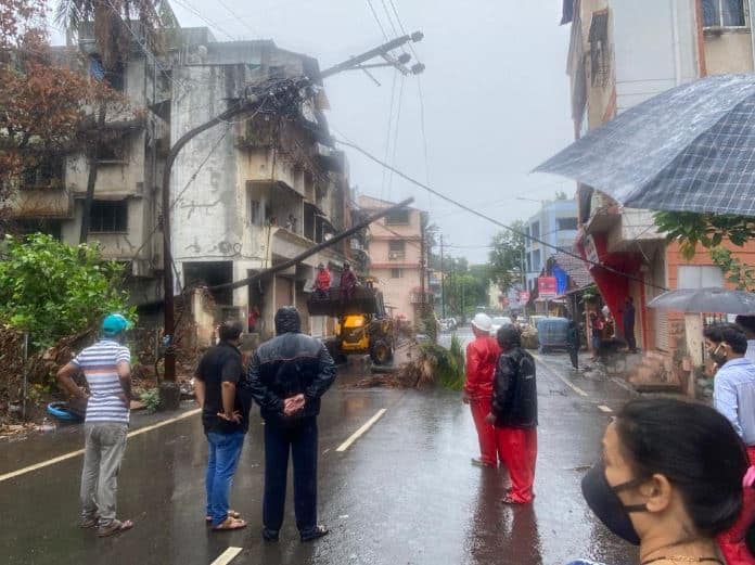 Many trees uprooted in the Raigad district due to strong winds in view of Cyclone Nisarga. National Disaster Response Force team along with Brihanmumbai Municipal Corporation, evacuated local residents near the seashore in Versova today to safer places. / Image: ANI