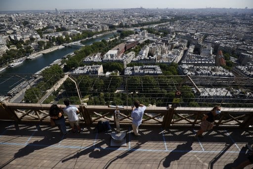 Here’s a view of the River Seine and the Musee du quai Branly  Jacques Chirac (R) seen from the Eiffel Tower. (Photo by Thomas SAMSON / AFP)