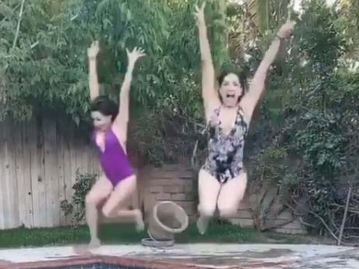 Sunny Leone Enjoys With Friend In Swimming Pool!  Watch: Sunny Leone Takes A HOT Dip In Pool With Her Friend!