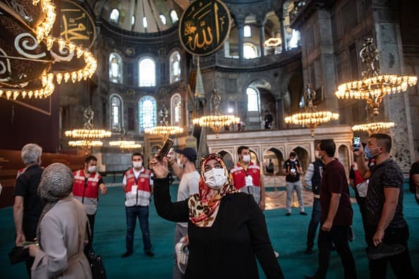 Several cabinet ministers and other top officials also joined the huge crowd of worshippers who had gathered for the inaugural prayers. (Getty Images)