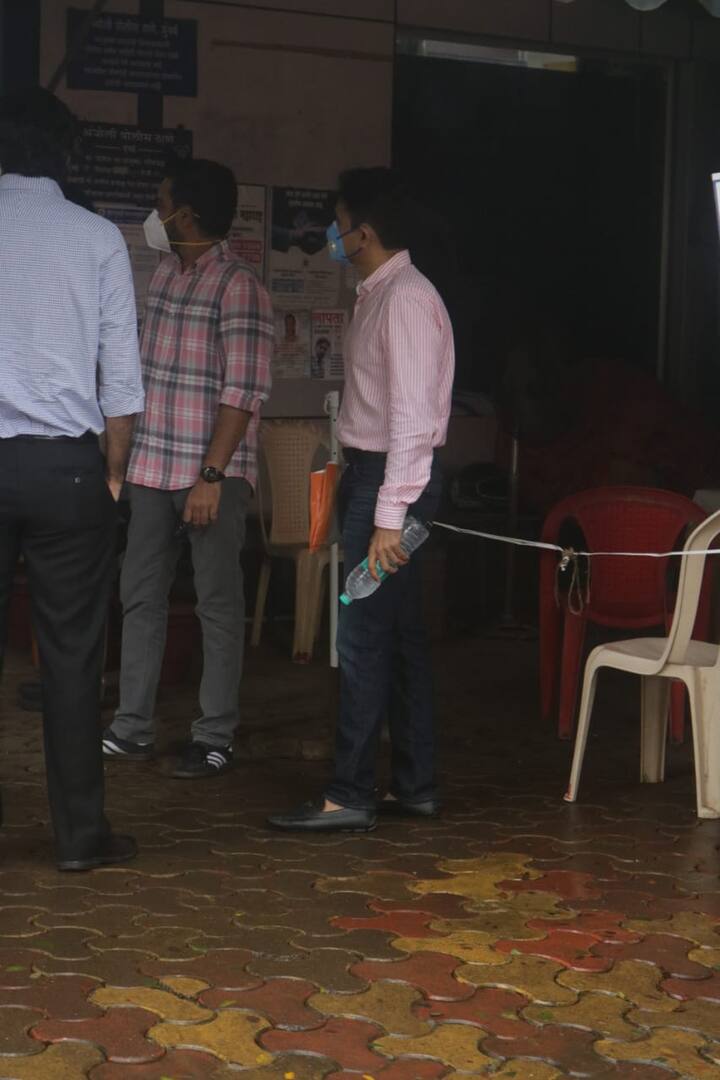Apoorva was clicked by the paparazzi as he arrived at Amboli police station and was seen wearing a mask, with a bottle of water.