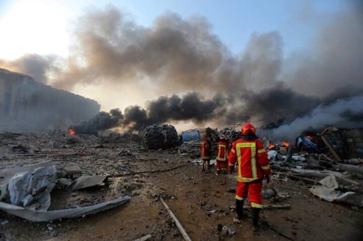 Picture shows the scene of an explosion at the port in the Lebanese capital Beirut on August 4, 2020. (Photo by STR / AFP)