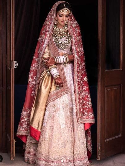 While speaking to a national daily, designer Anamika Khanna revealed that “the lehenga is a hand done zardosi with the finest form of chikankari and gold metalwork teamed with a woven gold dupatta.