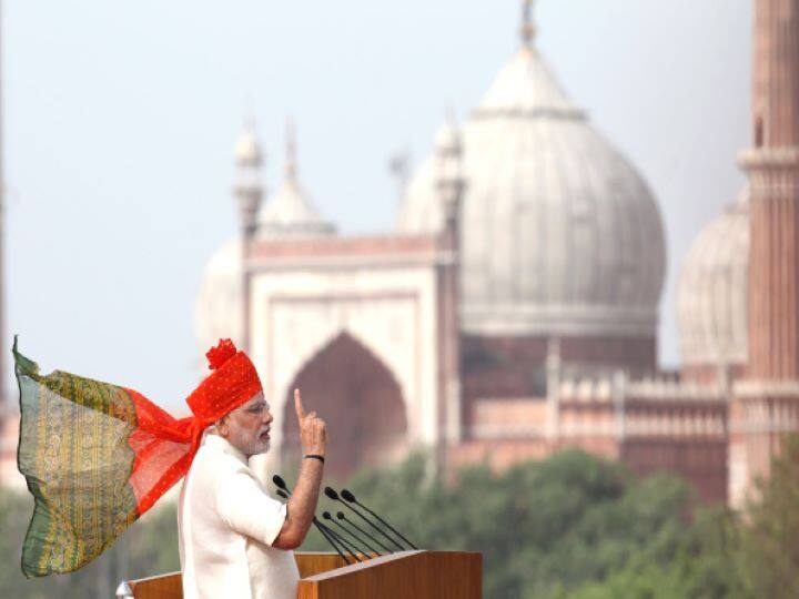 IN 2014, For his maiden Independence Day address as the Prime Minister, Modi opted for a Jodhpuri bandhej turban in bright red colour with green at the trail and wore a half-sleeve cream coloured khadi kurta. (Getty Images)