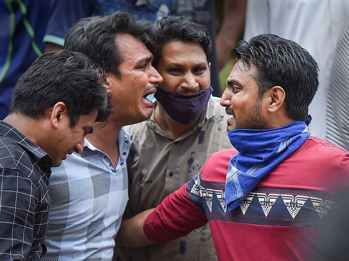 With rescue operations in full swing in the huge mound of rubble of the erstwhile Tarique Garden, at least seven more injured victims were found in addition to more than 25 others rescued on Monday night. (PTI Photo/Kunal Patil)(PTI25-08-2020_000050B)