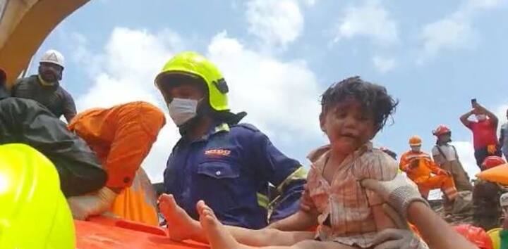 A 3 year and 6 months old child was saved by the rescue teams, after remaining stuck inside the rubble of the building for over 19 hours. The rescuers have been carrying out the operation tirelessly since last evening./Image: ABP Majha.