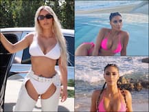 PICS: Reality TV Star Kim Kardashian Raises OOMPH In Pink Bikini While Posing In A Beach