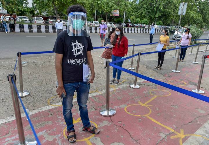 Students maintain social distancing before entering a centre. According to media reports the BTech paper 1 mathematics had questions with very lengthy calculation. Most questions fell in moderate level of difficulty. Image (PTI)