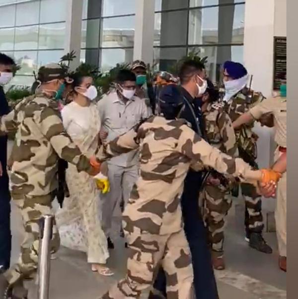 In the photos, Kangana is seen wearing an off-white saree, and as always, she waved at the paparazzi.