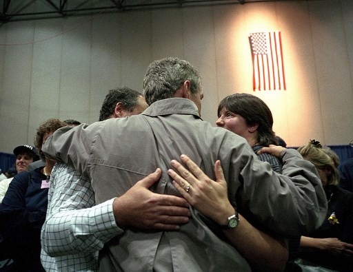 This photo released by The White House 15 September, 2001, shows US President George W. Bush (C) meeting 14 September, 2001, with families of victims of the 11 September terrorist attack on the World Trade Center. Soon after the attacks Bush declared the war on terrorism which targeted Islamic fundamentalists groups such as the Al-Qaeda, and the Taliban. After years of war, the mastermind of the attack and Al-Qaeda Chief Osama bin laden was killed in Pakistan in the year 2011, where he was living in hiding. Image (AFP)