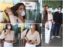 IN PICS: Newly Married Poonam Pandey Flaunts Sindoor, Manglasutra & Chooda At The Airport While Posing With Husband Sam Bombay
