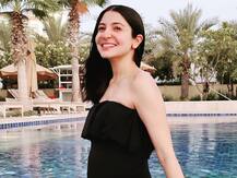 Anushka Sharma Shares A Stunning Photo Flaunting Her Baby Bump In A Black Monokini As She Celebrates World Gratitude Day
