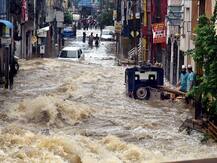 IN PICS: Mayhem In Hyderabad After Incessant Rainfall; Localities Submerged, Vehicles Washed Away