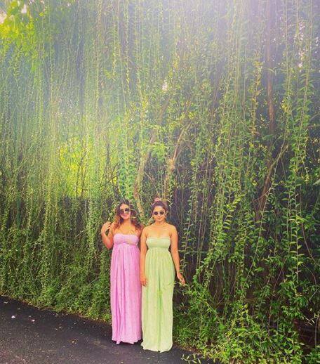 The actress is accompanied by her friend for her trip