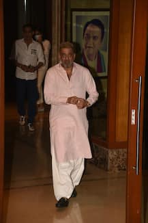 PICS: Sanjay Dutt Flashes 'Thumbs Up' To Paps As He Returns Home After Beating Cancer, Poses With Sister Priya Dutt