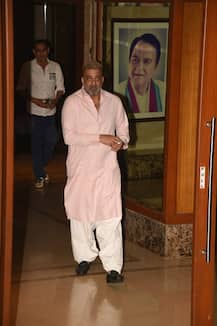 PICS: Sanjay Dutt Flashes 'Thumbs Up' To Paps As He Returns Home After Beating Cancer, Poses With Sister Priya Dutt