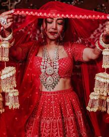 IN PICS | Neha Kakkar's All Red Wedding Lehenga Reminds Us Of Priyanka Chopra's D-day; You Agree?