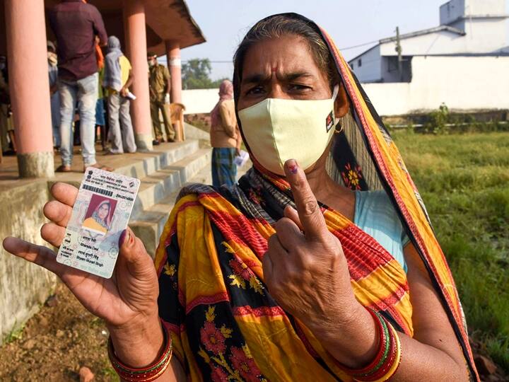 Patna: A voter shows her finger marked with idelible ink after casting her vote for the first phase of Bihar Assembly Elections, at Paliganj constituency in Patna, Wednesday,  Oct. 28, 2020. (PTI Photo)