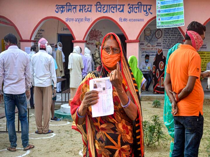 Kaimur: A voter shows her finger marked with indelible ink after casting her vote for the first phase of Bihar Assembly Election, amid the coronavirus pandemic, at Bhabhua police station in Kaimur district, Wednesday, Oct. 28, 2020. (PTI Photo)