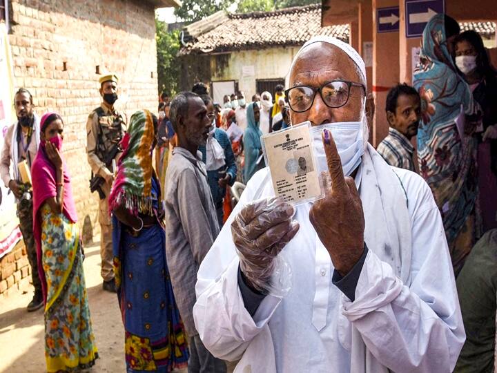 Patna: A voter shows his finger marked with indelible ink at a polling station after casting his vote for the first phase Bihar Assembly Elections, at Paliganj in Patna, Wednesday, Oct. 28, 2020. (PTI Photo)