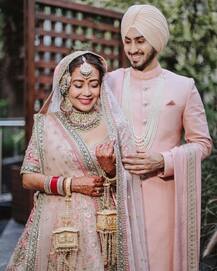 Unseen Pictures From Neha Kakkar-Rohanpreet Singh’s Wedding; See The Lovebirds Locking Lips Post Their Engagement