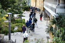 IN PICS | US Elections 2020: Voters Queue Up For Polls While America's Battle Against Covid-19 Crisis Continues