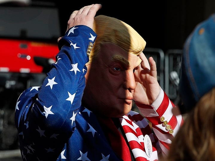 Philadelphia : A demonstrator wears a mask of President Donald Trump outside the Pennsylvania Convention Center where votes are being counted, Friday, Nov. 6, 2020, in Philadelphia. AP/PTI (AP06-11-2020_000260A)