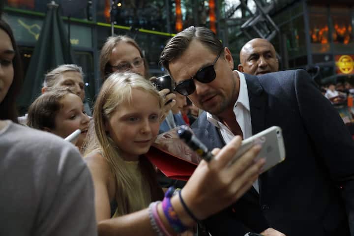 Leonardo DiCaprio everyone’s beloved actor turns 46 today. The actor began his acting career in the late 80s by starring in TV commercials after which he worked in a few series, he hit the silver screen by taking up unconventional roles. Image (AFP)