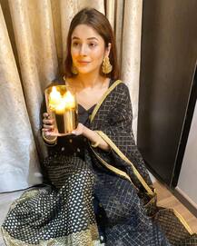 PICS: Bigg Boss 13's Shehnaaz Gill Wears Fan-Gifted Dress On Diwali; Sidharth Shukla Looks Dapper In Black