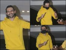 PICS: Kartik Aaryan Celebrates His Birthday With Paparazzi, Looks Cool In Yellow Hoodie As He Cuts Cake