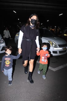 IN PICS: Sunny Leone SNAPPED With Family AT Mumbai Airport As They Arrive From LA!
