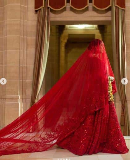 Another one captured Priyanka's beautiful bridal look as she holds the veil after getting ready for the grand event.