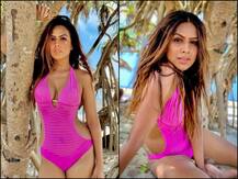PICS: TV's Diva Nia Sharma Sizzles In Pink Monokini, Sets Internet On Fire With Her Stunning Avatar