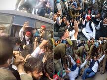 IN PICS: Cops Detain Akhilesh Yadav, Other Samajwadi Party Leaders As They Sit On Dharna On Road