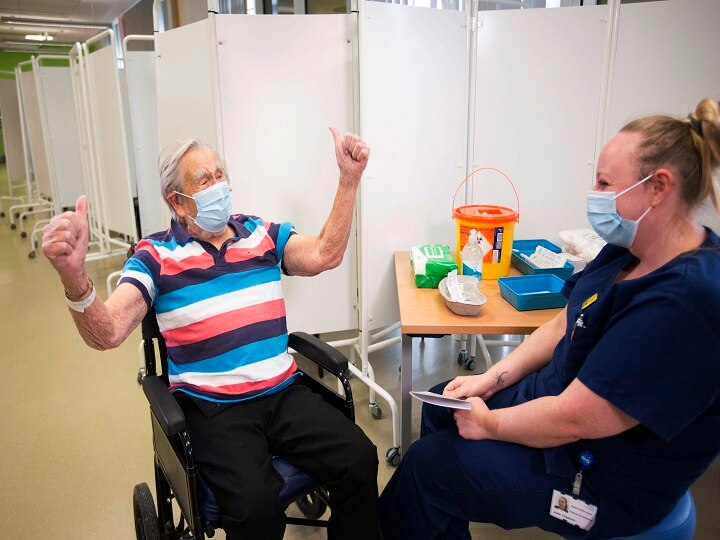 Henry (Jack) Vokes, 98, reacts receiving the Pfizer-BioNTech COVID-19 vaccine at Southmead Hospital, Bristol, England. The UK is the first country in the world to start using the Pfizer vaccine after regulators approved its use last week. (Getty Image)