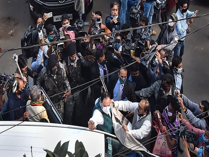 Nadda on Wednesday launched the 'Griha Sampark Abhiyan' in the city Wednesday as part of the party's 'Aar Noi Annay' (No More Injustice) campaign in poll-bound West Bengal. There was blowing of conch shells and showering of flower petals by women wearing red bordered sarees as Nadda's motorcade reached Bhawanipore area of the city. (Image: PTI)