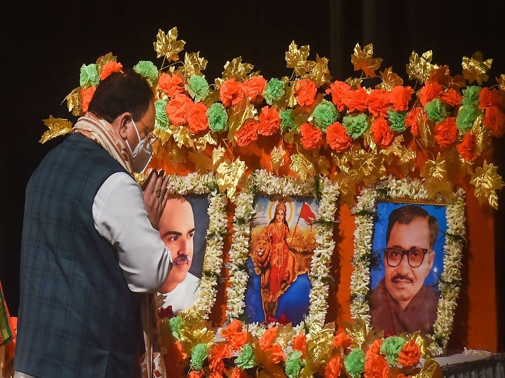 Nadda visited a few households on Girish Mukherjee Road, a few km away from Cbief Minister Mamata Banerjee's residence, briefly interacted with the locals, heard their problems and requested them to give BJP a chance before boarding the car, party sources said. (Image: PTI)
