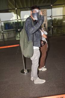 These Pics Of Arjun Rampal & Girlfriend Gabriella Holding Their Sleeping Baby Son At Airport Is Just Too Awwdorable!