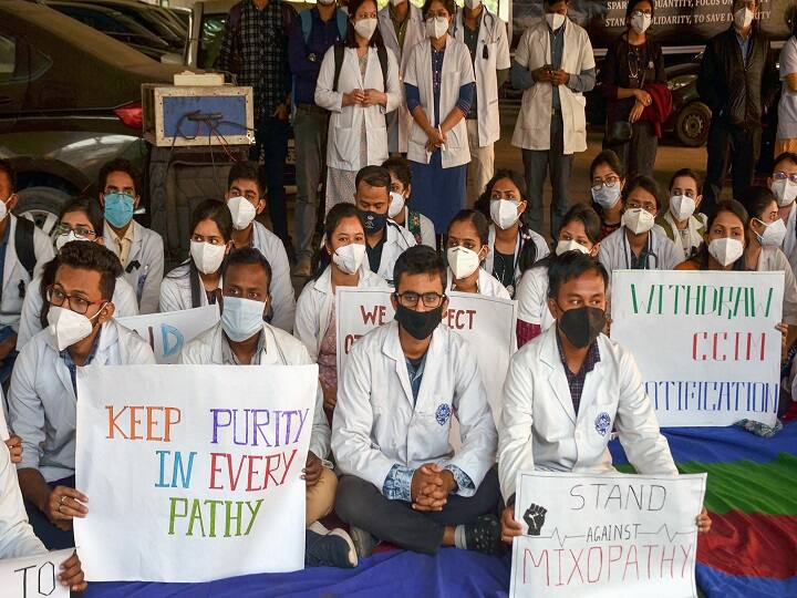 Members of Junior doctors' Association stage a protest in solidarity with Indian Medical Association's strike against Mixopathy and demanding the withdrawal of CCIM notification, at Guwahati Medical College and Hospital (GMCH) in Guwahati. (Image: PTI)