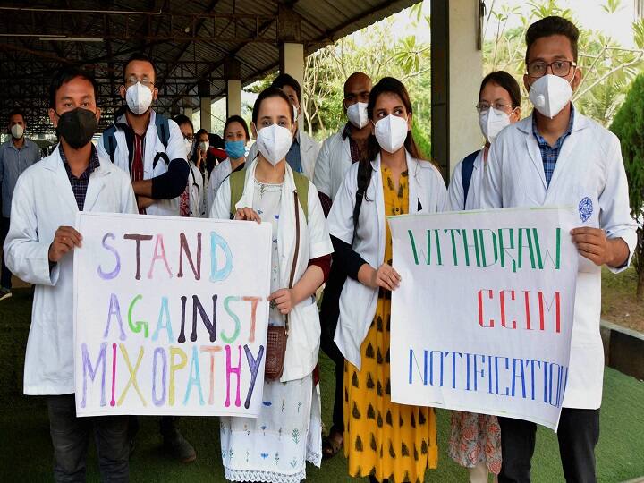 Members of Junior doctors' Association stage a protest in solidarity with Indian Medical Association's strike against Mixopathy and demanding the withdrawal of CCIM notification, at Guwahati Medical College and Hospital (GMCH) in Guwahati. (Image: PTI)