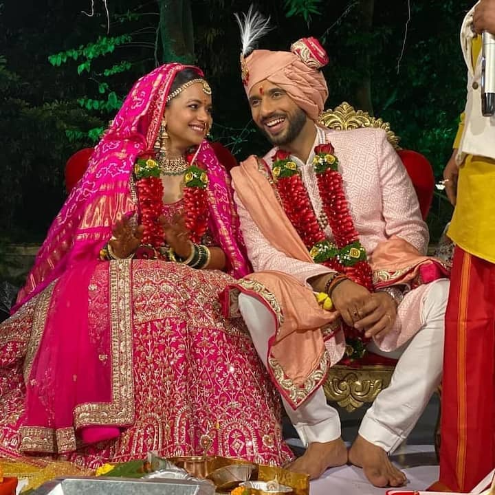 3. The bride and the groom looked extremely lovely in their wedding outfits.