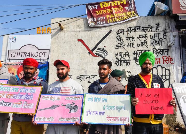 Farmers have fiercely opposed laws they say endangers their livelihoods. They raised slogans during their 'Delhi Chalo' protest march against the new farm law. (Image Source: PTI)