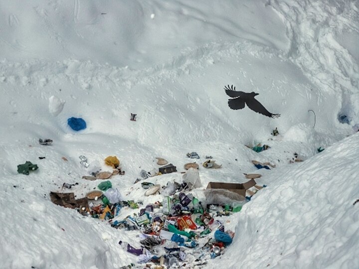 Waste items (Polythene, Bottles) thrown in open at snow-covered tourist hotspot Gulmarg, Baramulla, Jammu and Kashmir. (Photo by Nasir Kachroo/NurPhoto via Getty Images)