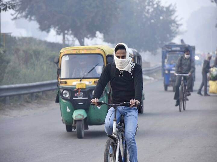 Commuters driving amid fog on a cold winter morning at National Highway 48 near Hero Honda Chowk in Gurugram. The residents of national capital continued to shiver as icy cold winds blowing from snow-laden western Himalayas have led to a dip in the mercury. (Photo via Getty Images)