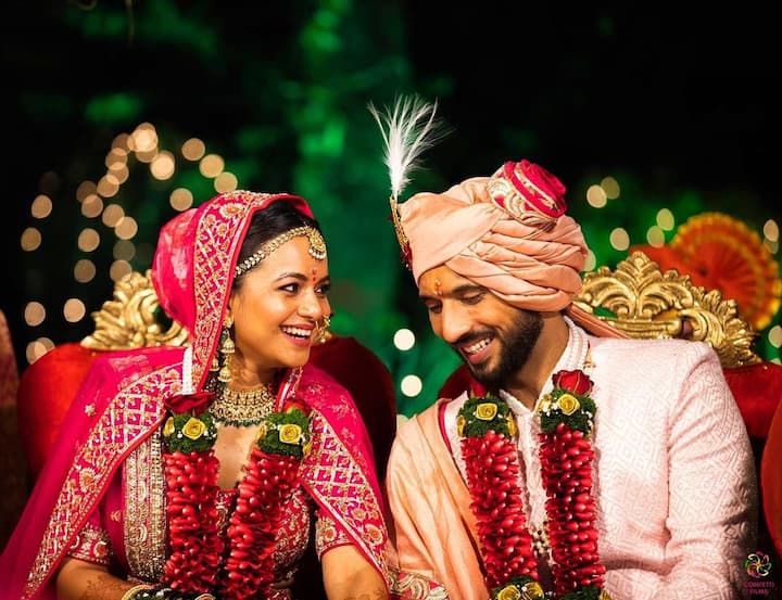 Popular choreographer and 'Khatron Ke Khiladi 9' winner Punit Pathak recently got married to his fiancée Nidhi Moony Singh on December 11. For their big-day, the bride opted for a pink lehenga while the groom colour co-ordinated with his bride by wearing a light pink sherwani for the ceremony. (Image: @punitpathakofficial/Instagram)
